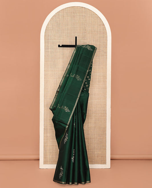 Green Mayuri Soft Silk Saree, Beautified with Floral Buttas All Over Its Body, Subtle Striped Border, Pallu Steeped with Geometric Designs, and Paired with a Matching Blouse