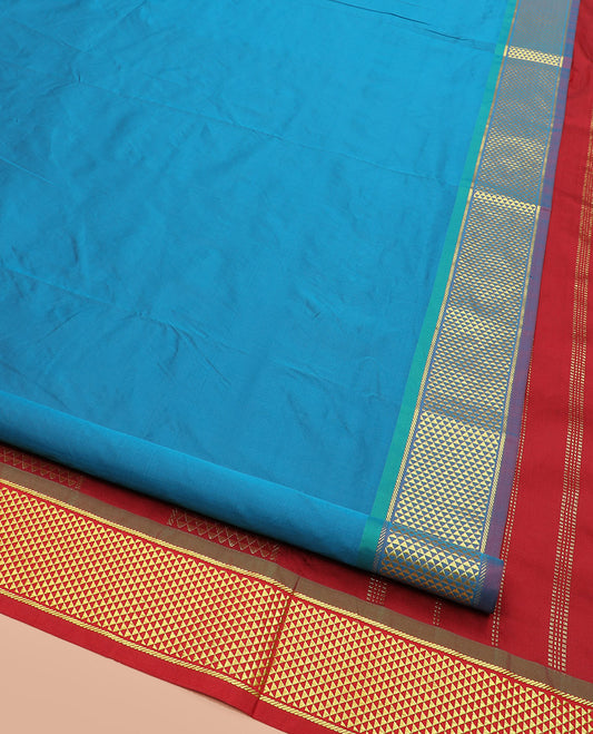 Blue Plain Ten-Yard Art Silk Saree, Complemented by a Contrast Traditional Ara Maadam Border, and Pallu Entralled with Zari Designs,