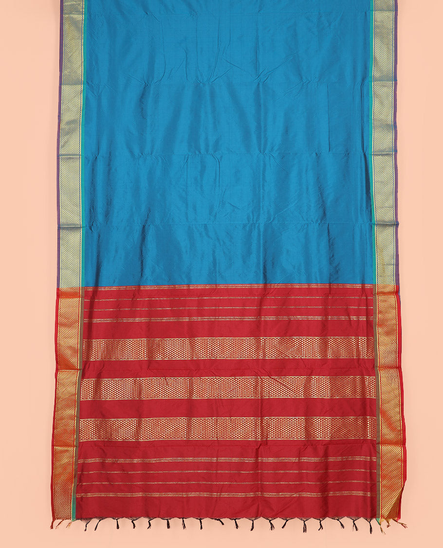 Blue Plain Ten-Yard Art Silk Saree, Complemented by a Contrast Traditional Ara Maadam Border, and Pallu Entralled with Zari Designs,