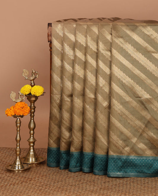 Mehendi green golden zari striped burberry silk saree, contrast zari border & pallu features 1000 dobby-style buttas