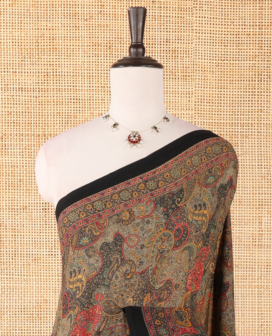 Black intricate paisley printed kimaya saree, floral printed border, paisley printed pallu & contrast printed blouse