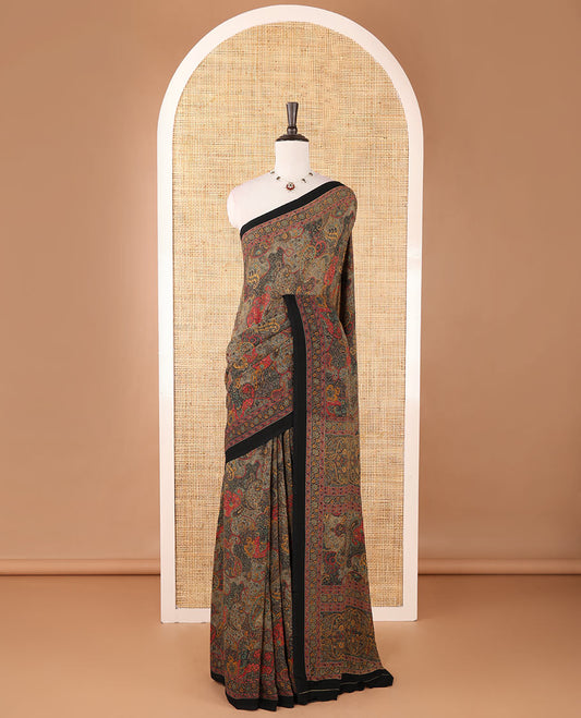Black intricate paisley printed kimaya saree, floral printed border, paisley printed pallu & contrast printed blouse
