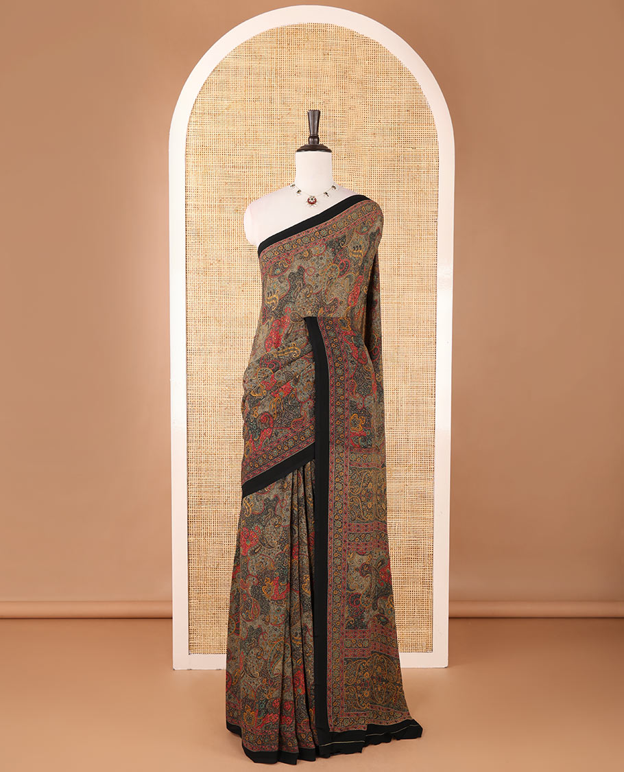 Black intricate paisley printed kimaya saree, floral printed border, paisley printed pallu & contrast printed blouse