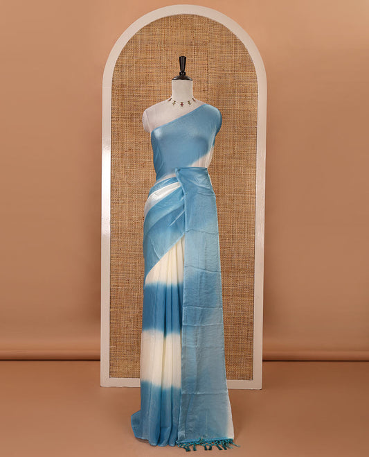 Borderless blue tie-dye-style printed fendy satin saree, self-pallu with tassels & plain blouse