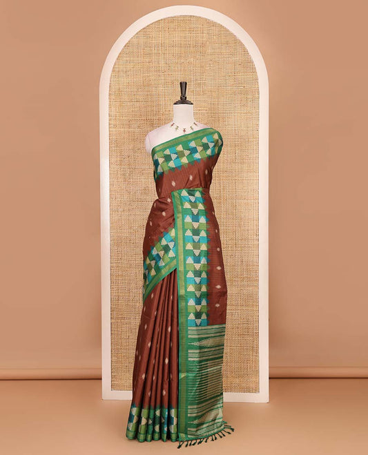 Brown striped and buttas kathan silk saree, contrast multi-color temple border, seer printed pallu, and contrast printed blouse