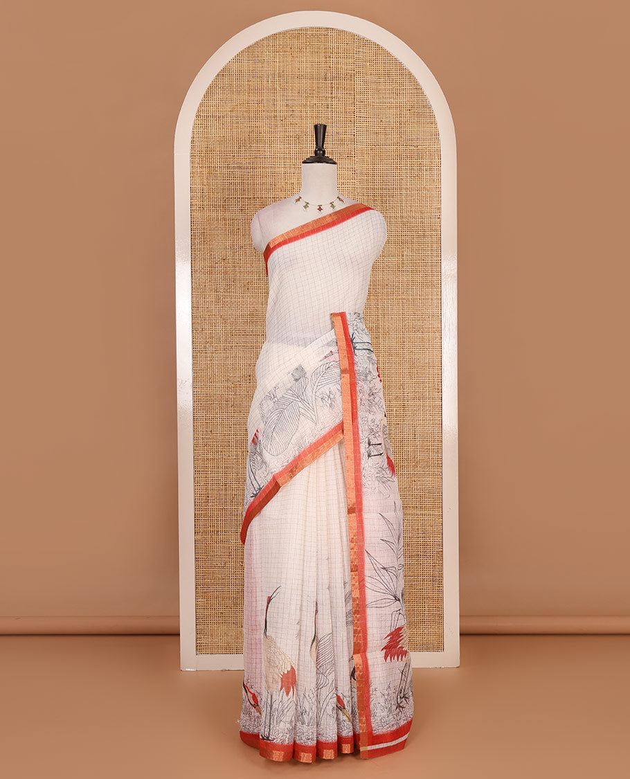 White with orange zari checks linen saree with contrast border and unique designs of pallu along with contrast plain blouse