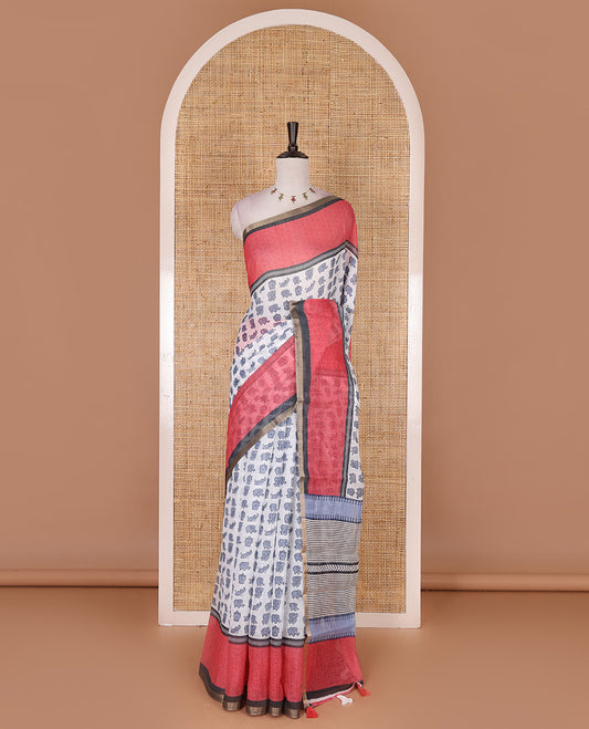 White cute elephant motifs printed linen cotton saree, contrast chevron border, pallu of stripes and chevron, and contrast printed blouse