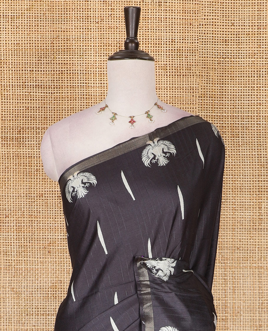 Black jasmine bud motifs printed kathan silk saree, double-headed eagle motif zari piping border, pichwai cow printed pallu, and floral printed blouse