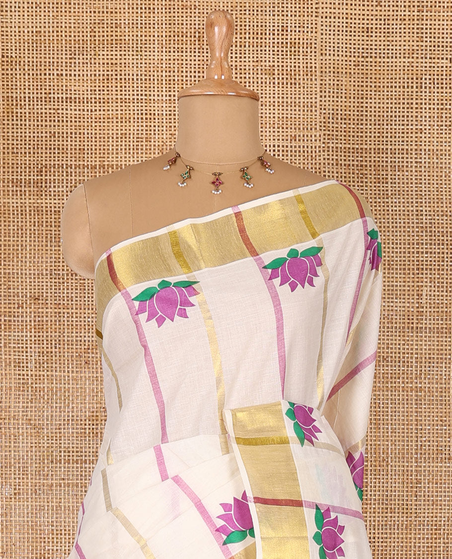 Cream-purple striped and Pichwai lotus motifs printed Kerala cotton saree, gold zari striped border, and a matching blouse