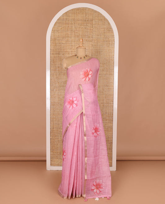 Baby pink daisy floral printed linen cotton saree, gold zari piping border, daisy floral printed pallu, and matching  floral printed blouse