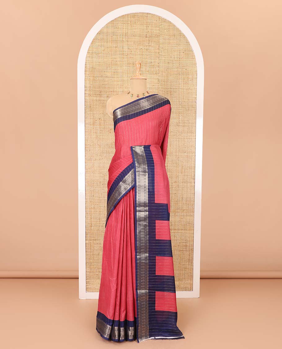 Pink vertically striped moss chiffon saree with contrast traditional zari design borders, striped pallu, and a contrast blouse