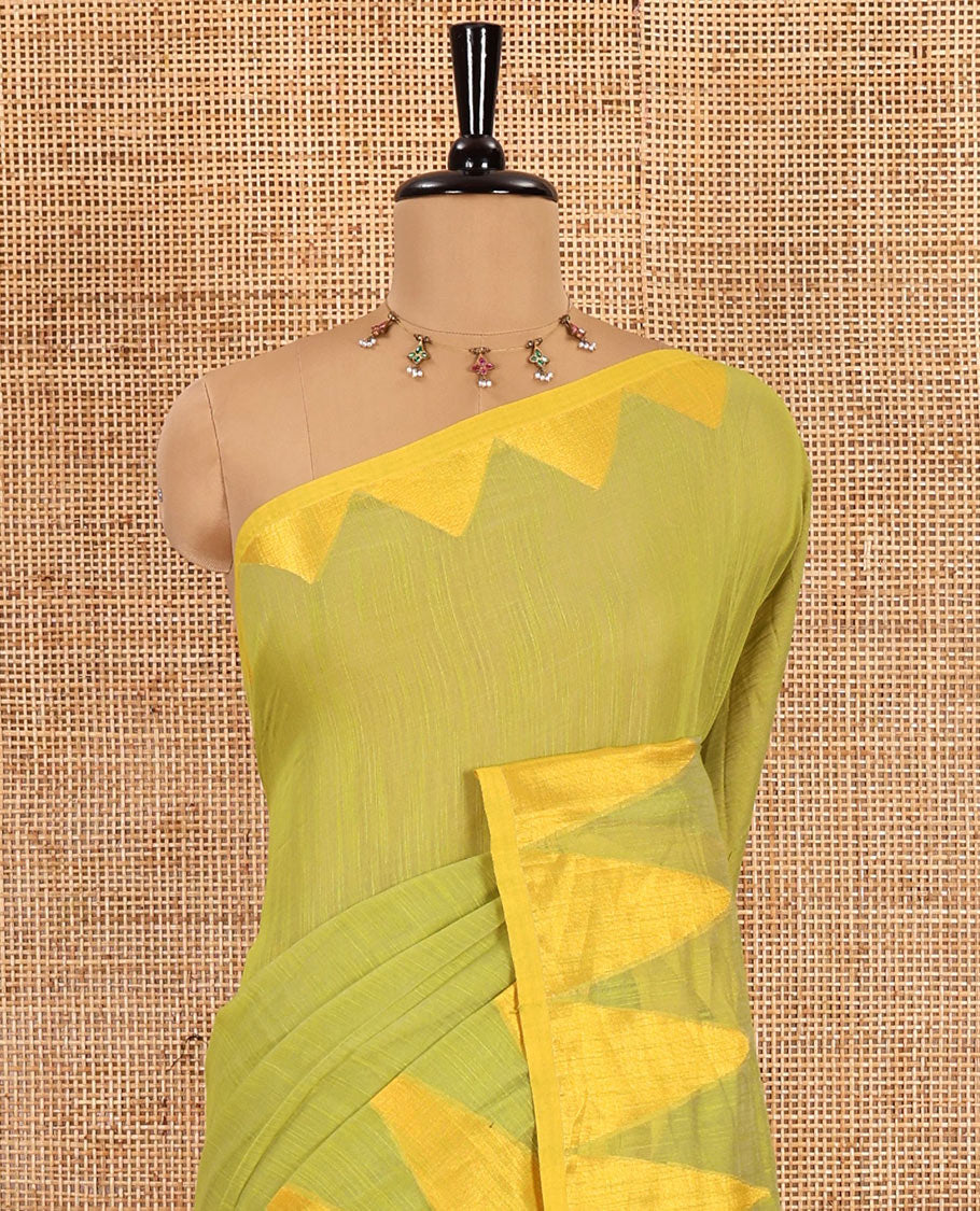 Green plain khadi mul cotton saree, contrast thread temple border, plain pallu, and a contrast plain blouse
