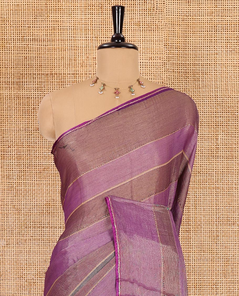 Purple horizontal striped fendy chiffon saree, piping border, striped palu, and blouse of sequins and zari buttas