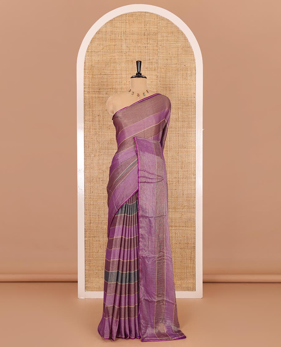 Purple horizontal striped fendy chiffon saree, piping border, striped palu, and blouse of sequins and zari buttas