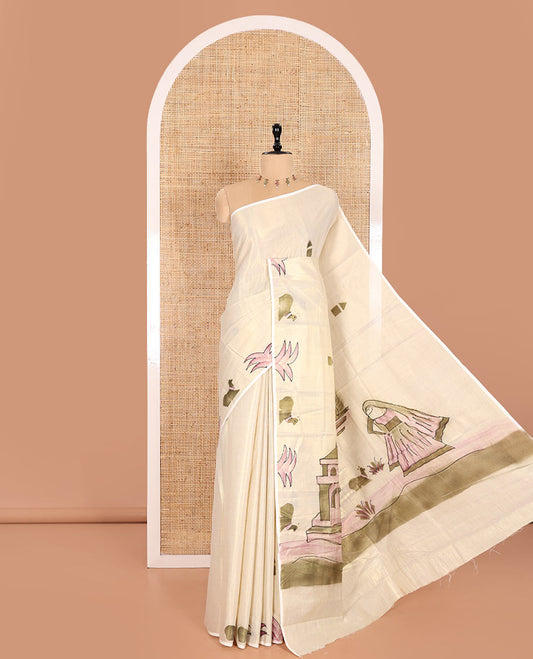 Gold-Green Kerala Cotton Saree Subtly Sparked with Handblock-Printed Flora-Fauna-Architecture Motifs, Featuring a Self Pallu with Matching Flora-Fauna-Architecture Handblock Prints, Paired with a Matching Plain Blouse.