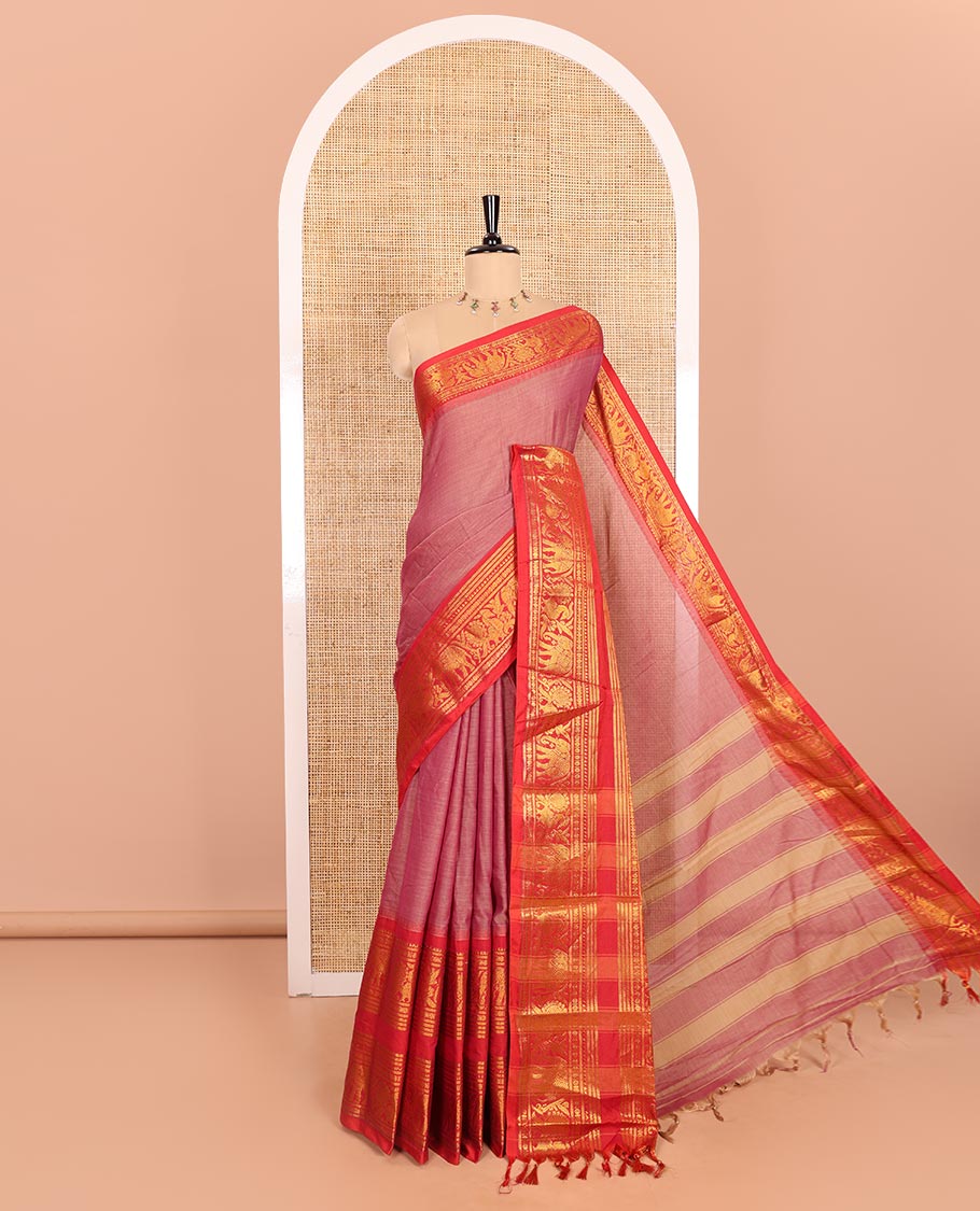 Light Purple Plain Mercerised Cotton Saree Highlighted with a Contrasting Rettai Pettu Border Featuring Peacock and Elephant Motifs in Zari, a Subtly Striped Pallu, and a Matching Blouse