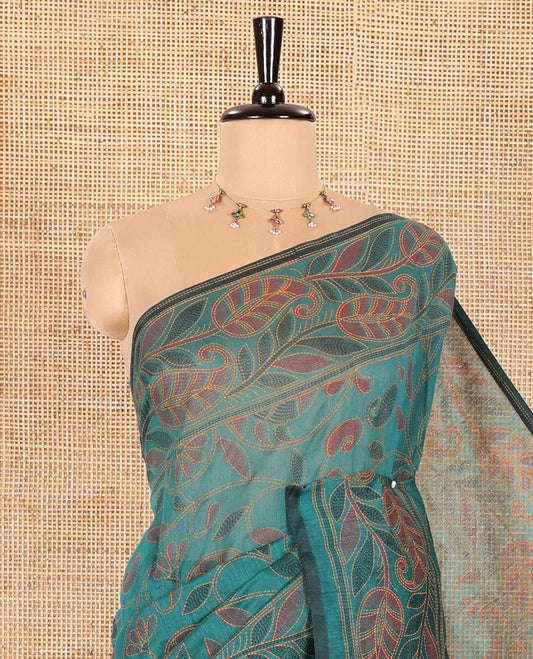 Peacock Green Khadi Cotton Saree Embellished with Kalamkari-Style Paisley-Floral Prints, Subtly Sparkled with Self-Border of Floral Creeper Designs, Complemented by Contrast Paisley-Floral Vine Pallu, and Paired with a Contrast Printed Blouse