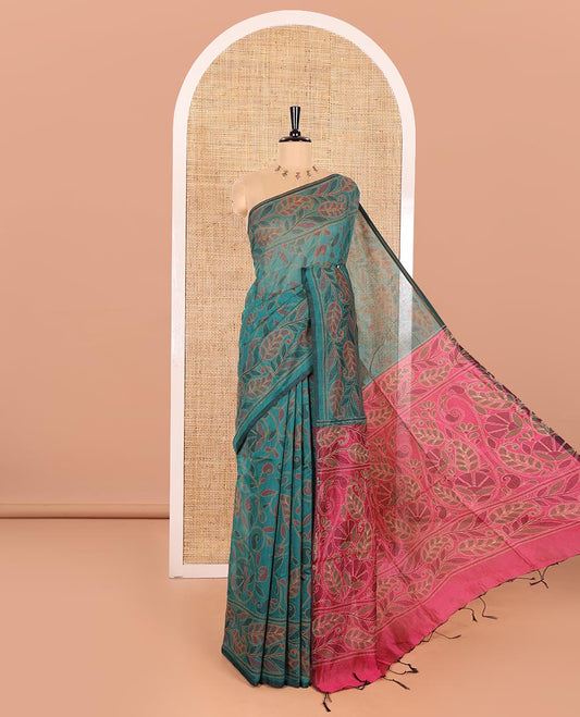 Peacock Green Khadi Cotton Saree Embellished with Kalamkari-Style Paisley-Floral Prints, Subtly Sparkled with Self-Border of Floral Creeper Designs, Complemented by Contrast Paisley-Floral Vine Pallu, and Paired with a Contrast Printed Blouse