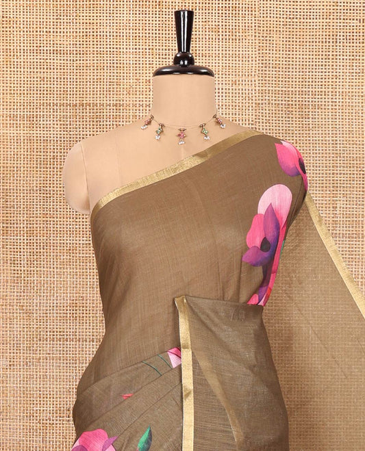 Olive Green Linen Cotton Saree, Adorned with Floral Motifs Printed on Its Body, Subtle Zari Piping Border, Pallu Mirrors the Floral Print, and Comes with a Matching Printed Blouse