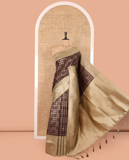 Brown Elite Soft Silk Saree, Highlighted by Checked Design on Its Body, Complemented by a Contrast Border of Jungle-Themed Flora-Fauna Motifs, a Pallu of Checked Design, and Paired with a Contrast Blouse