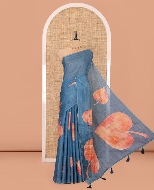 Borderless Blue Tissue Saree, Highlighted by Big Leaf Motifs Print, and Outline Embroidery All Over the Saree, Paired with a Subtle Leaf Motifs Printed Blouse