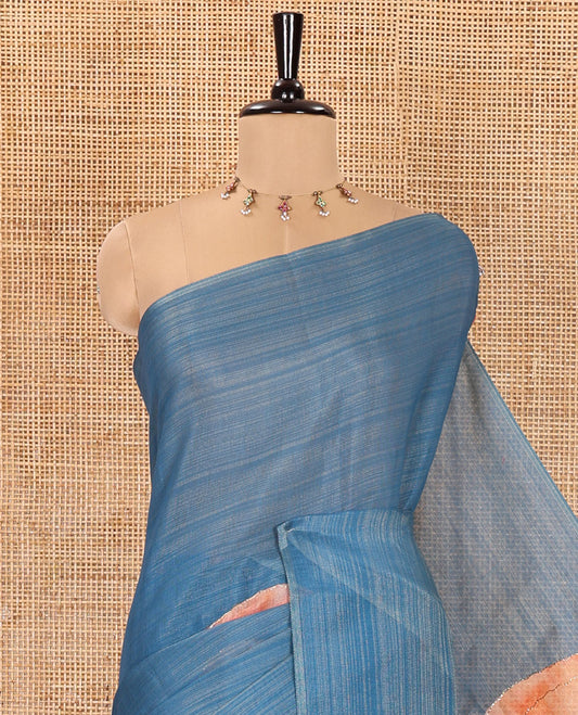 Borderless Blue Tissue Saree, Highlighted by Big Leaf Motifs Print, and Outline Embroidery All Over the Saree, Paired with a Subtle Leaf Motifs Printed Blouse
