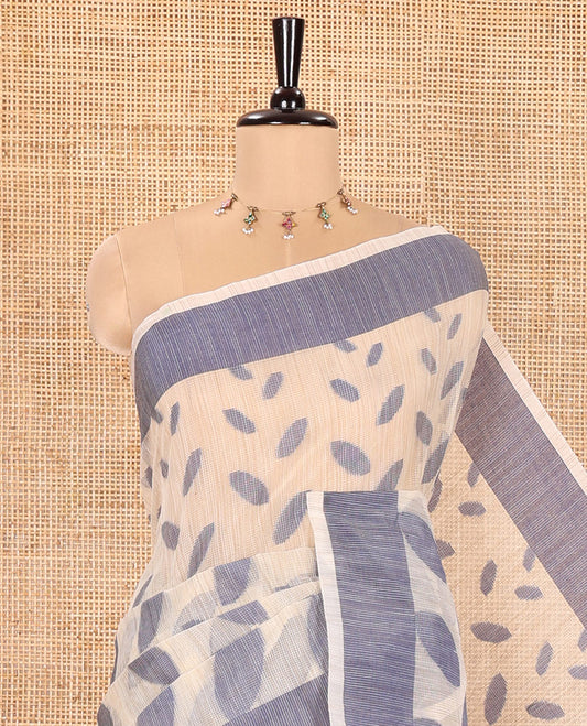 Chikku and Blue Manipuri Cotton Saree, Steeped with Leaf Motifs Printed on Its Body, Contrast Plain Border, Captivating Contrast Plain Pallu, and Paired with a Matching Blouse