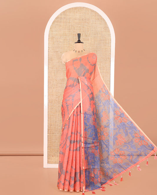 Orange Linen Cotton Saree, Adorned with Shibori Printed on Its Body, Subtle Piping Border, Pallu Features Floral Print, and Paired with a Contrast Floral Printed Blouse