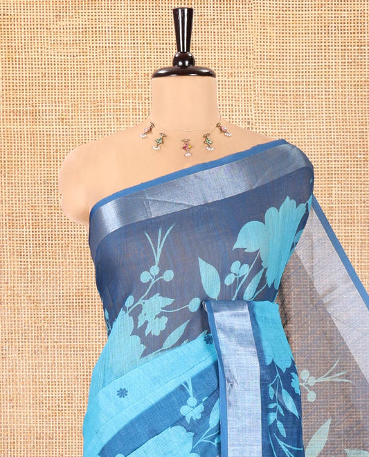 Blue Linen Cotton Saree, Beautified with Silhouette-Style Floral Vine Printed on Its Body, Subtly Zari Bavanji Border, Pallu of Same Floral Print, and Paired with a Matching Blouse