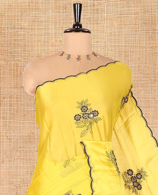Yellow Rangoli Chiffon Saree, Beautified with Flower-Style Motifs Embroidered on Its Body, a Subtle Scallop Embroidered Border, a Self-Pallu, and Paired with a Contrast Embroidered Blouse