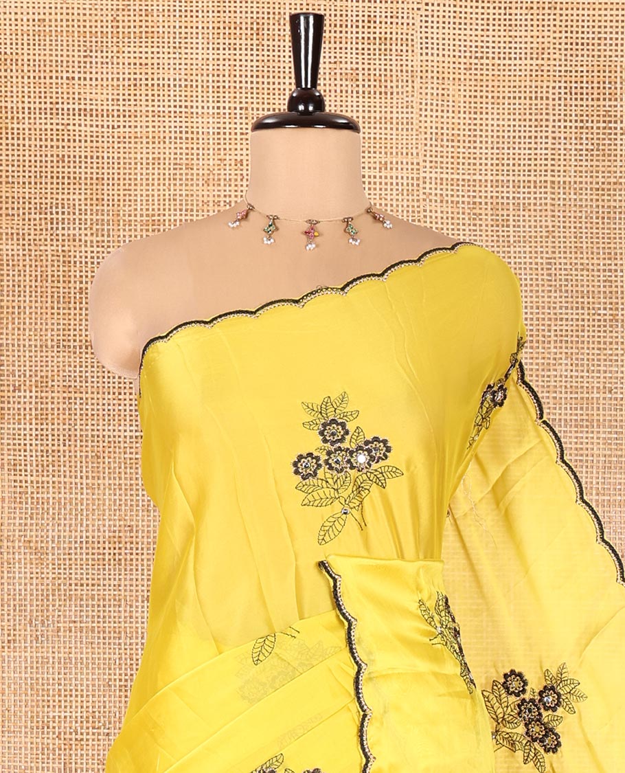 Yellow Rangoli Chiffon Saree, Beautified with Flower-Style Motifs Embroidered on Its Body, a Subtle Scallop Embroidered Border, a Self-Pallu, and Paired with a Contrast Embroidered Blouse