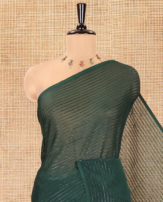 Borderless Bottle Green Chiffon Saree, Gleamed Up with Horizontal Stripes on Its Body, a Self-Pallu, and Comes Without a Blouse