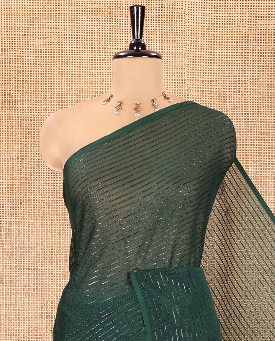 Borderless Bottle Green Chiffon Saree, Gleamed Up with Horizontal Stripes on Its Body, a Self-Pallu, and Comes Without a Blouse