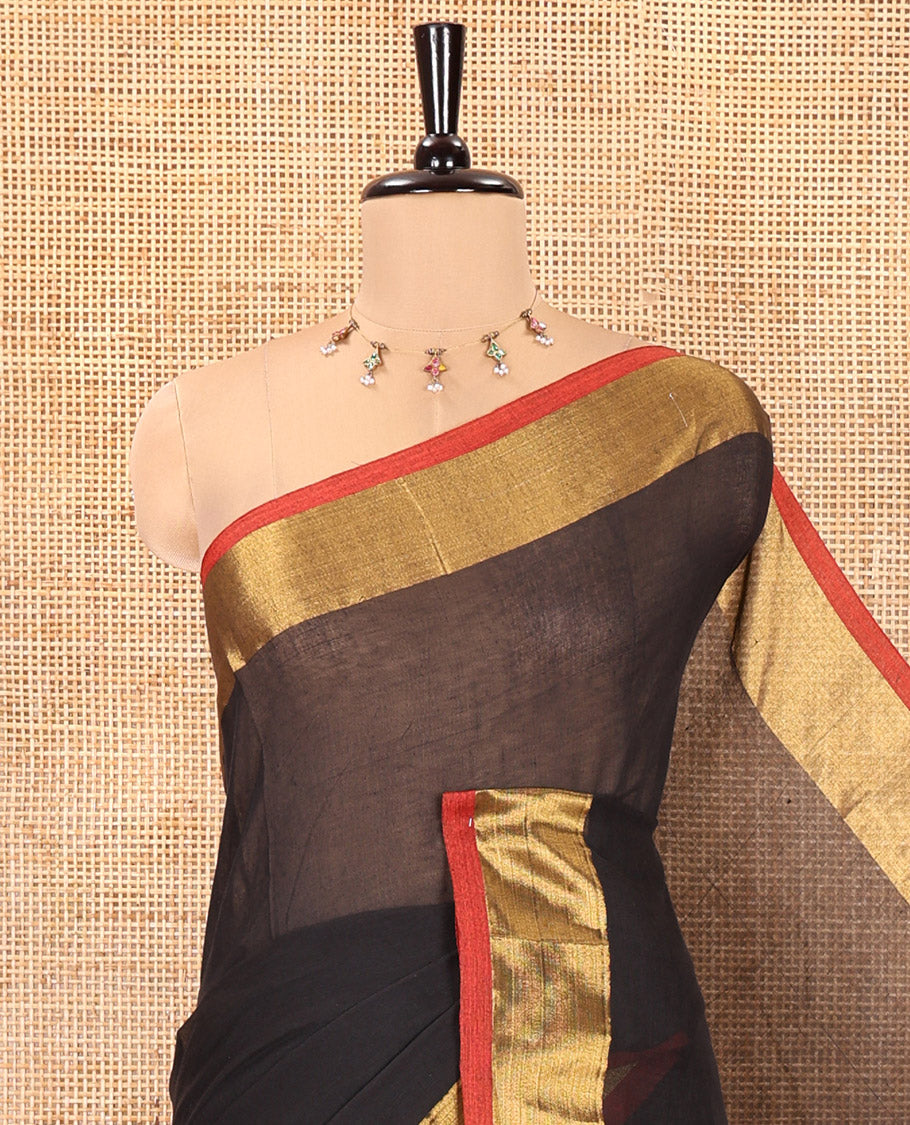 Black Plain Khadi Mul Cotton Saree, Complemented by a Contrast Zari Border, a Self-Pallu, and Paired with a Matching Blouse