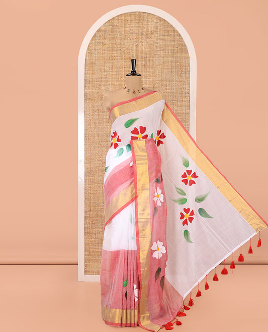 White and Peach  Khadi Mul Cotton Saree, Adorned with Hand-Brush Painting-Style Floral Block Printed Body, a Subtle Gold Zari Border, a Self-Pallu, and Paired with a Matching Blouse