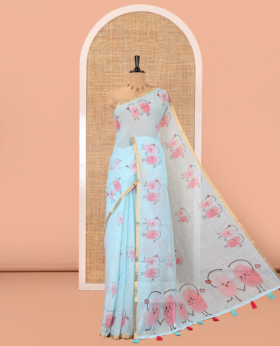 Blue Linen Cotton Saree, Creatively Printed with Thumb Finger Printed Cartoon-Theme Print on Its Body, a Subtle Piping Border, a Self-Printed Pallu, and Paired with a Matching Blouse