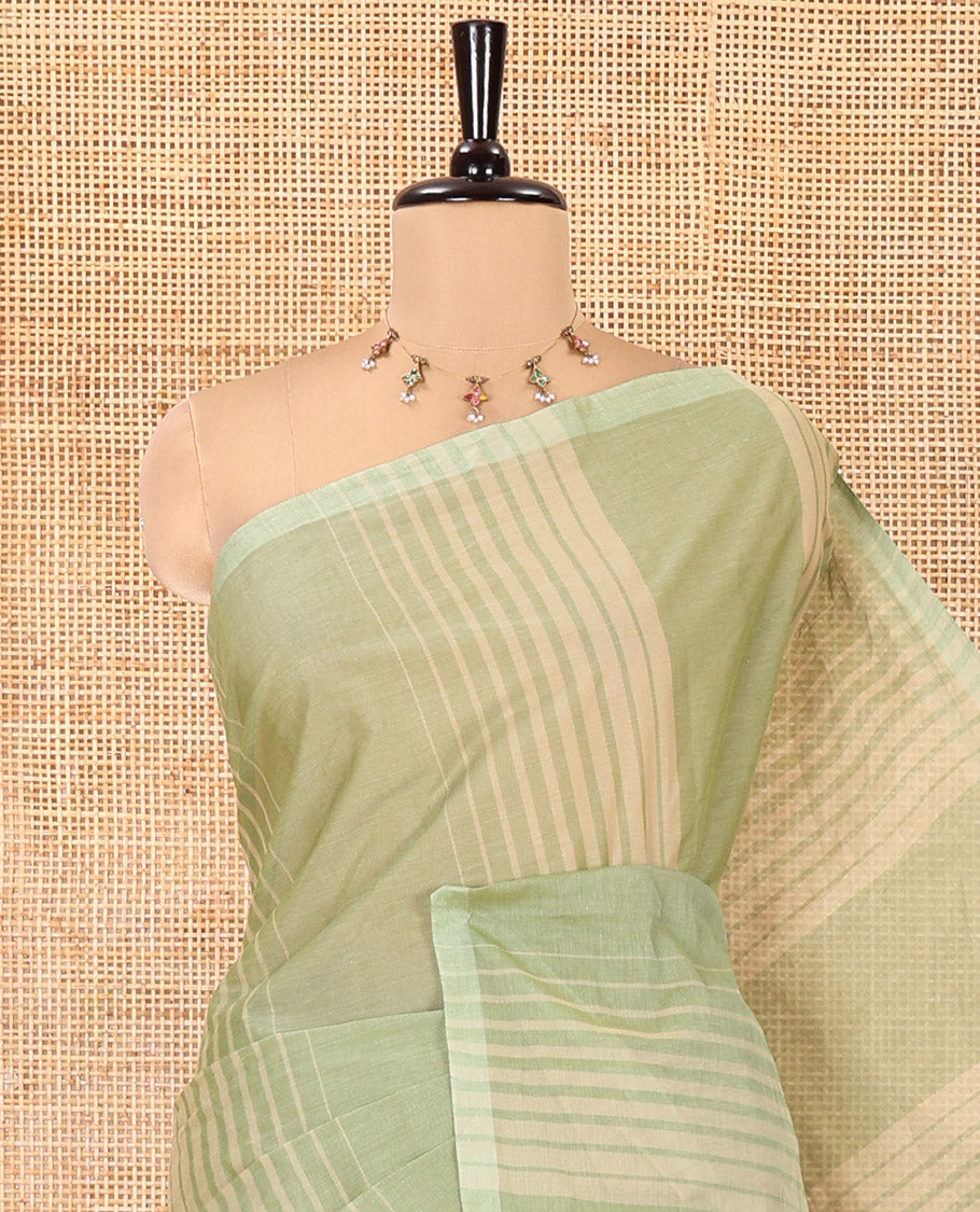 Borderless Green Negamam Cotton Saree, Subtly Sparkled with Stripes All Over Its Body, a Self-Pallu, and Paired with a Matching Blouse