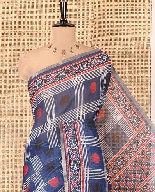 Blue Linen Cotton Saree, Adorned with Polka Dot Enclosed Checked Design on Its Body, Complemented by Contrast Ajrakh Printed Border, Intricately Ajrakh Printed Pallu, and Paired with a Matching Blouse
