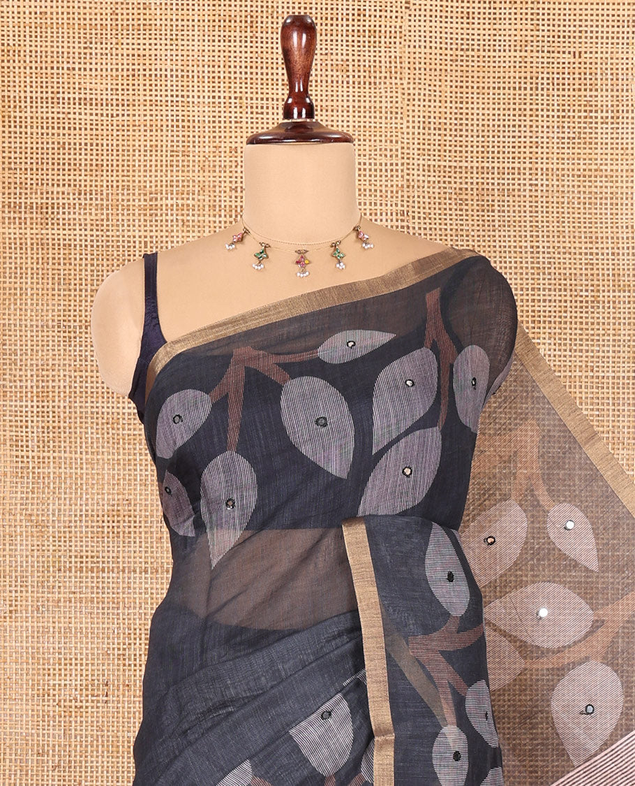 Black Linen Cotton Saree Features Leaf Print and Mirrorwork, a Piping Border, Contrast Pallu, and a Matching Blouse