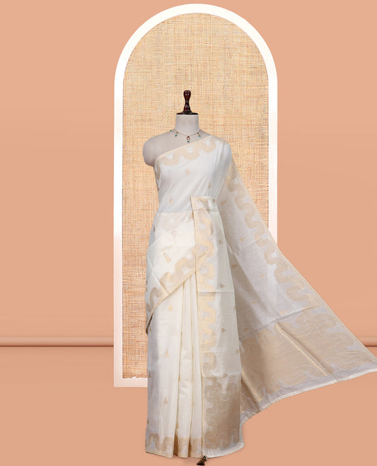Cream Chanderi Cotton Saree, Adorned with Zari Buttas, Highlighted by Zari Border, Grand Pallu, and a Matching Blouse