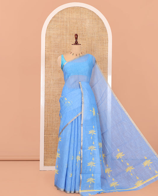 Borderless Blue Linen Cotton Saree Features Lotus Print, a Self-Pallu, and a Matching Blouse