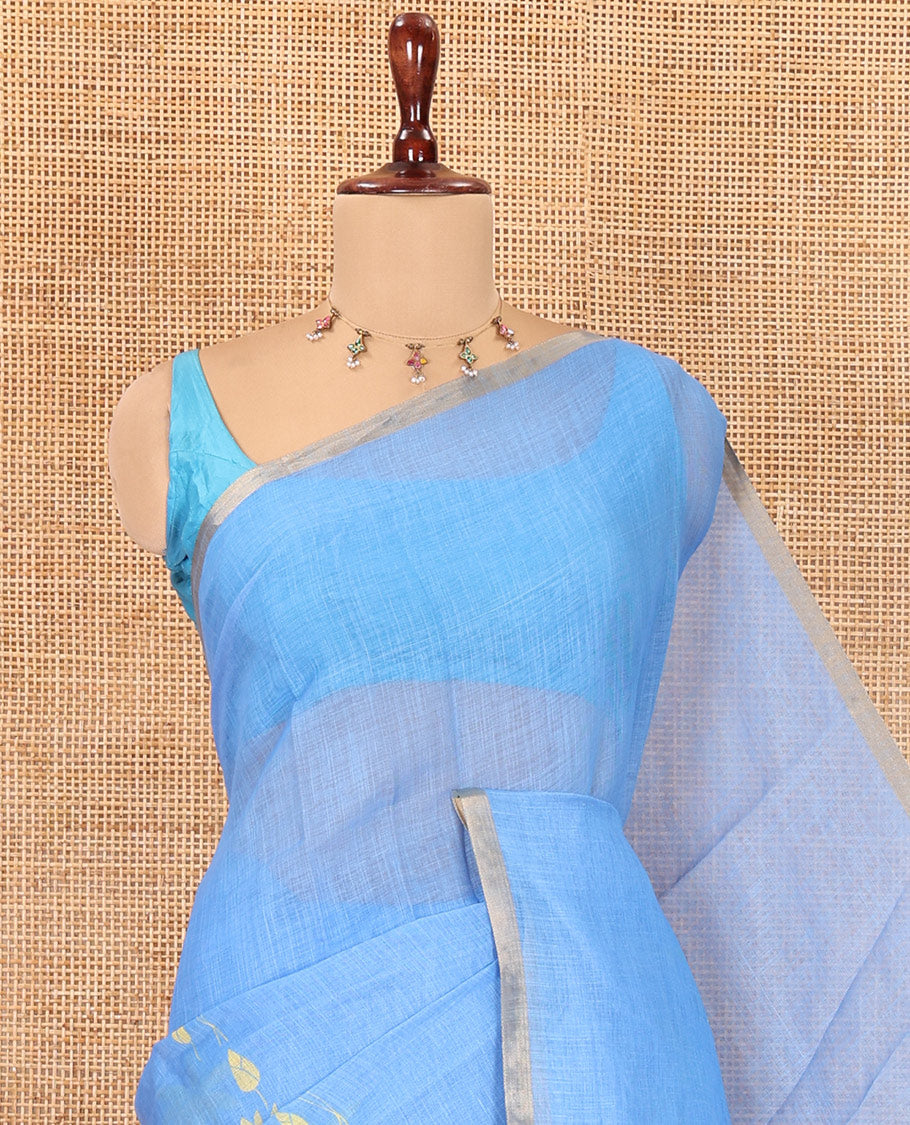 Borderless Blue Linen Cotton Saree Features Lotus Print, a Self-Pallu, and a Matching Blouse