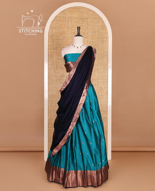 Rama blue taffeta silk half saree, zari buttas with contrast navy blue traditional zari border, matching zari blouse, and contrast plain zari border dhavani