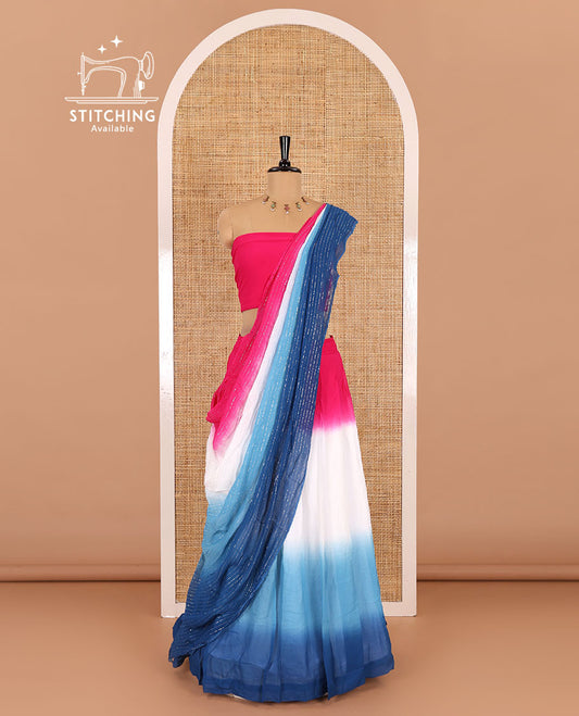Multi-color half-saree, ombre-colored viscose georgette skirt, a plain pink blouse, and a ombre-colored zari striped dhavani