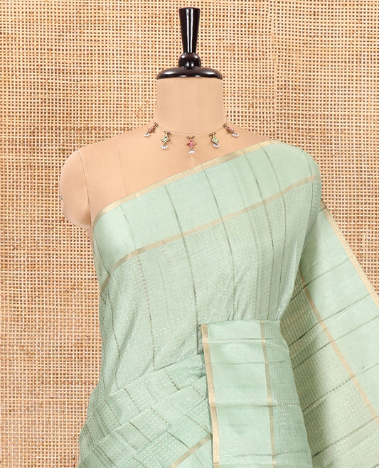 Pista green stripes woven fancy tussar saree, small bentex border, contrast dotted striped pallu, and a matching blouse