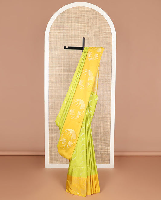 Light green leaf design soft silk saree with contrast zari design border & floral enclosed checked design pallu