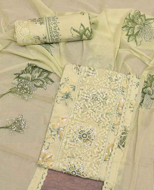 Yellow Cotton Material Churidar Set Features Floral Print and Floral Embroidery Top, Printed Bottom, and Floral Printed Dupatta