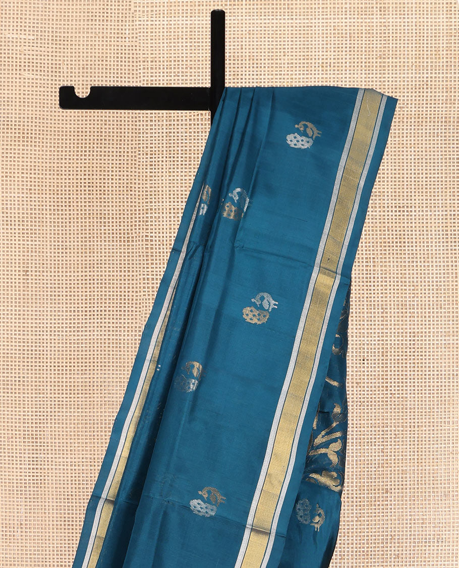 Blue Uppada Silk Saree, Enriched with Peacock Buttas All Over Its Body, Highlighted by a Zari Border, Pallu of Floral Vine Designs, and Paired with a Matching Blouse