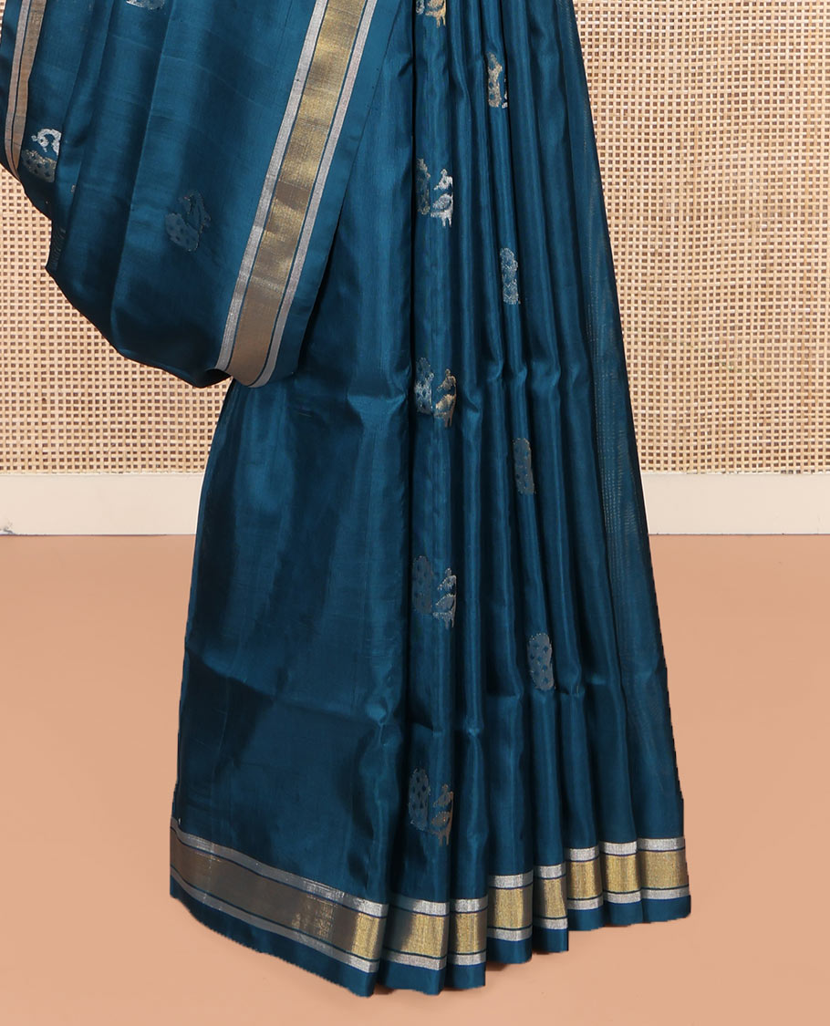 Blue Uppada Silk Saree, Enriched with Peacock Buttas All Over Its Body, Highlighted by a Zari Border, Pallu of Floral Vine Designs, and Paired with a Matching Blouse
