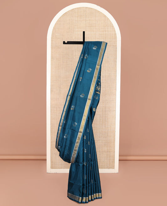 Blue Uppada Silk Saree, Enriched with Peacock Buttas All Over Its Body, Highlighted by a Zari Border, Pallu of Floral Vine Designs, and Paired with a Matching Blouse